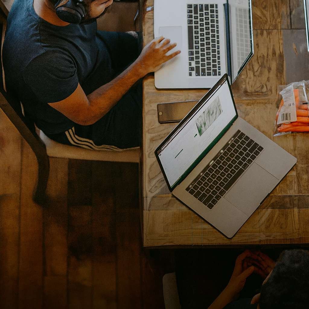 A person working on Laptop.